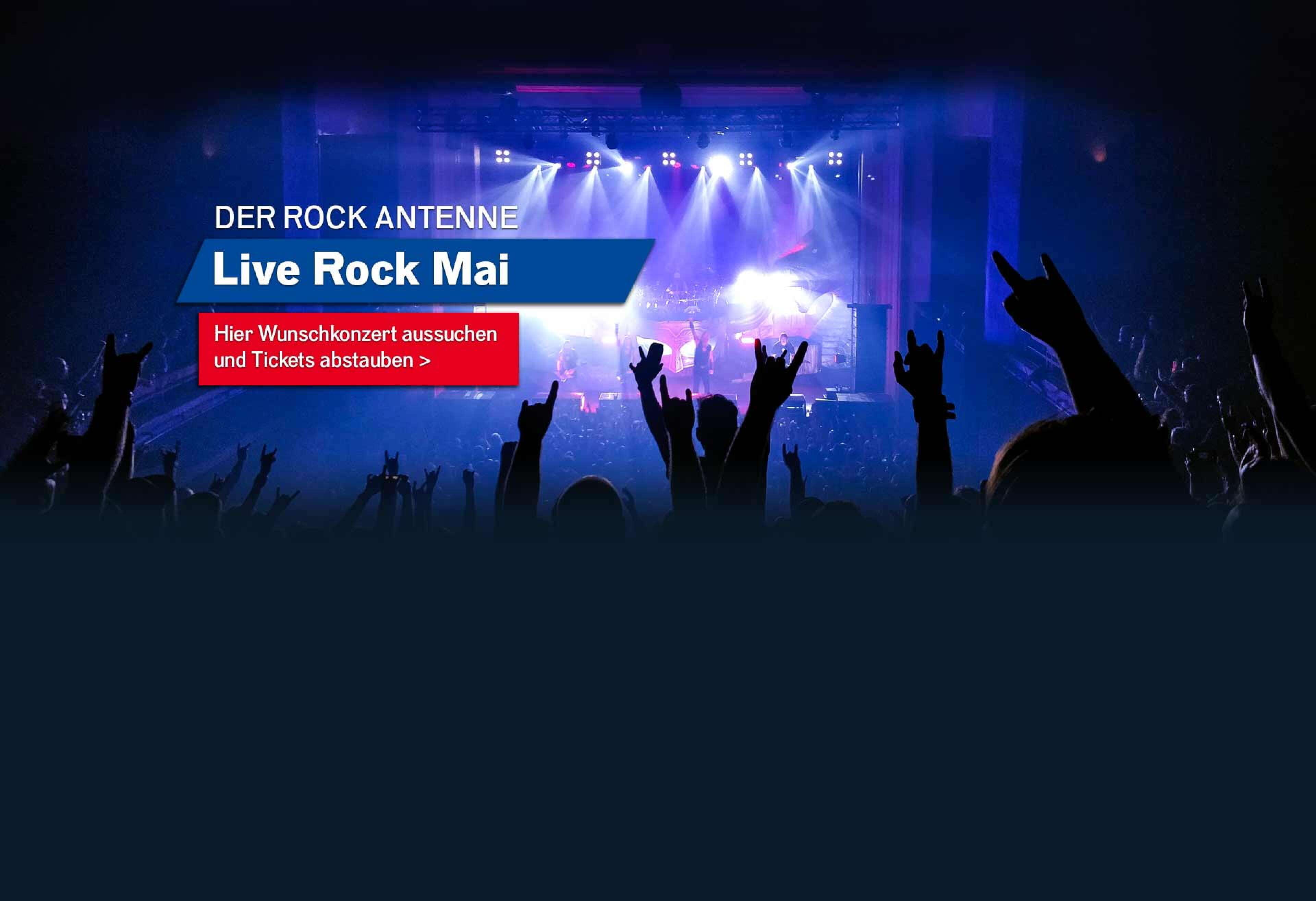 Bild eines Konzert-Publikums mit Blick auf die Bühne mit Aufschrift ROCK ANTENNE Live Rock Mai - hier Wunschkonzert aussuchen und Tickets abstauben!
