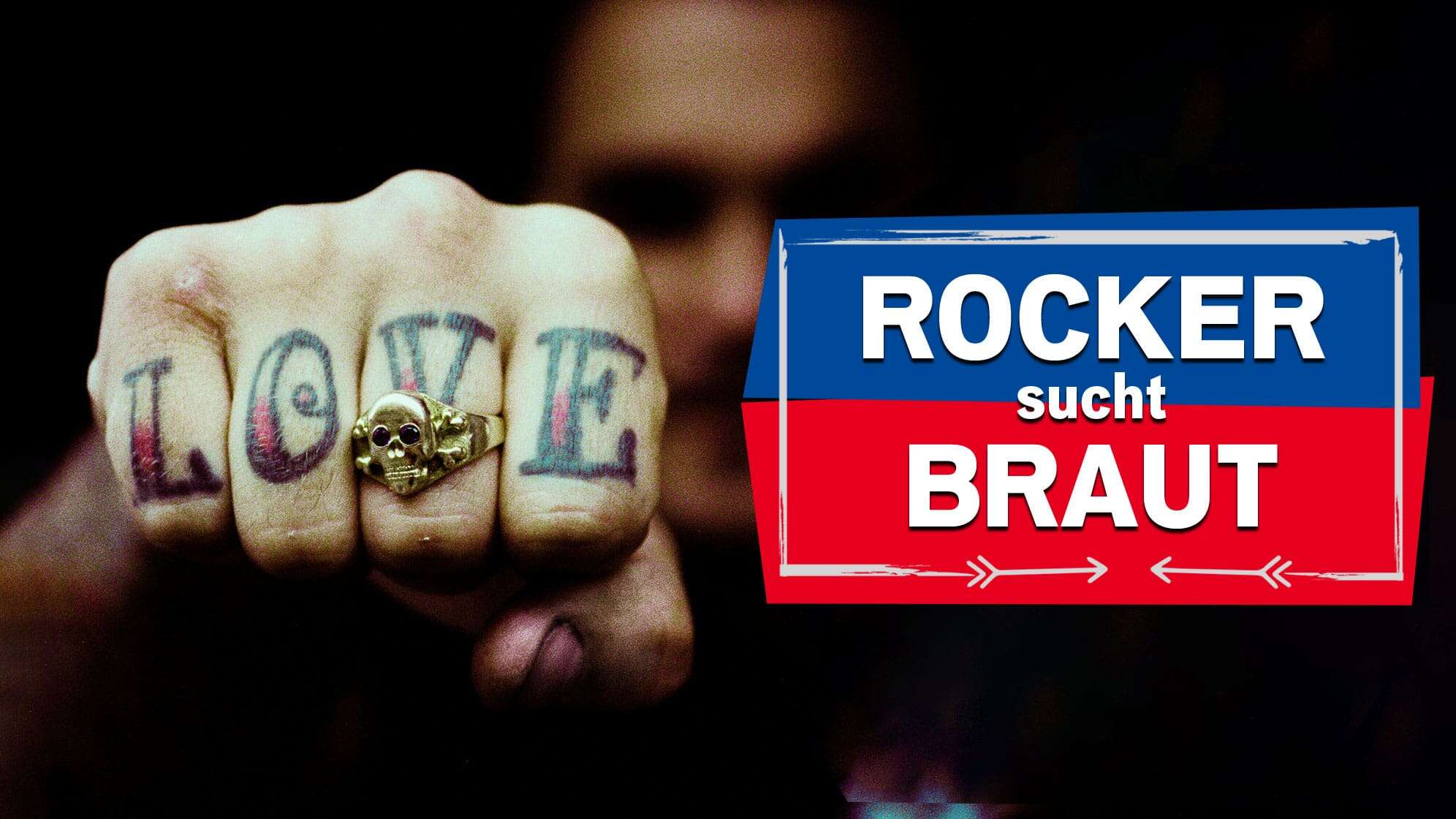 Mann streckt Faust Richtung Kamera, auf den Fingerknöcheln ist L-O-V-E tattoowiert; Dazu der Text: ROCKER sucht BRAUT