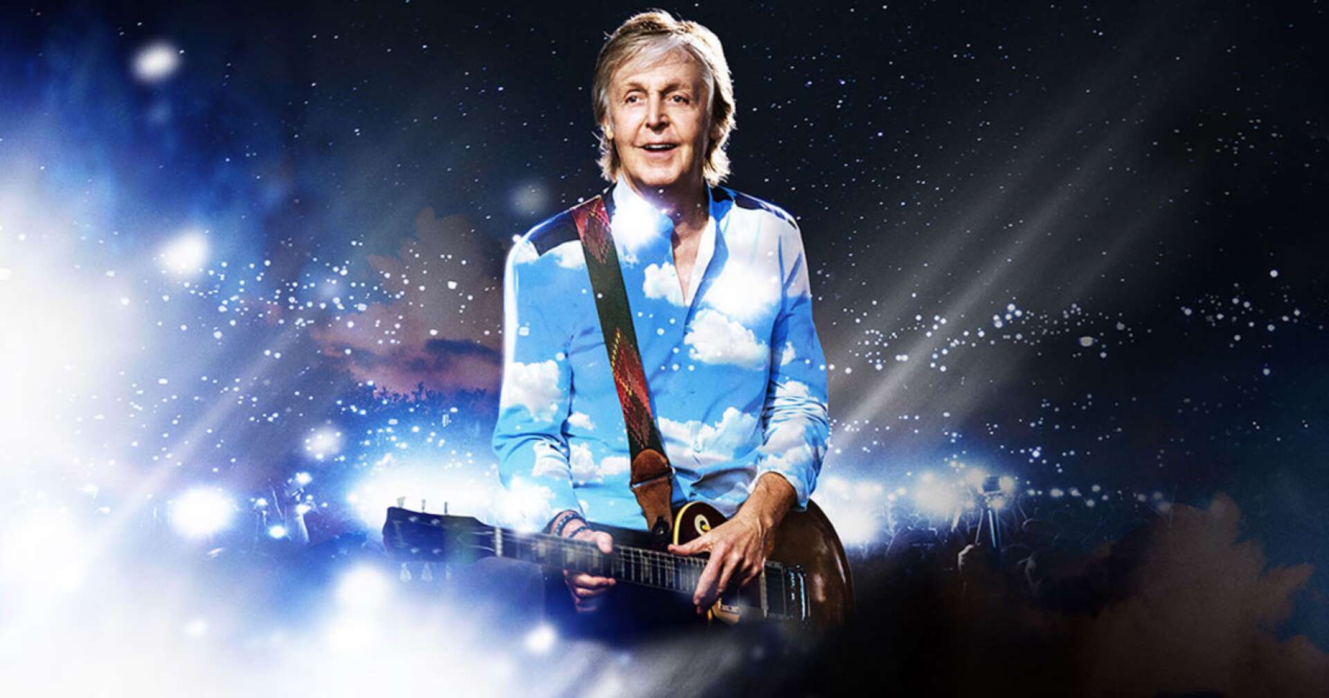 Paul McCartney und Fans auf einem Konzert