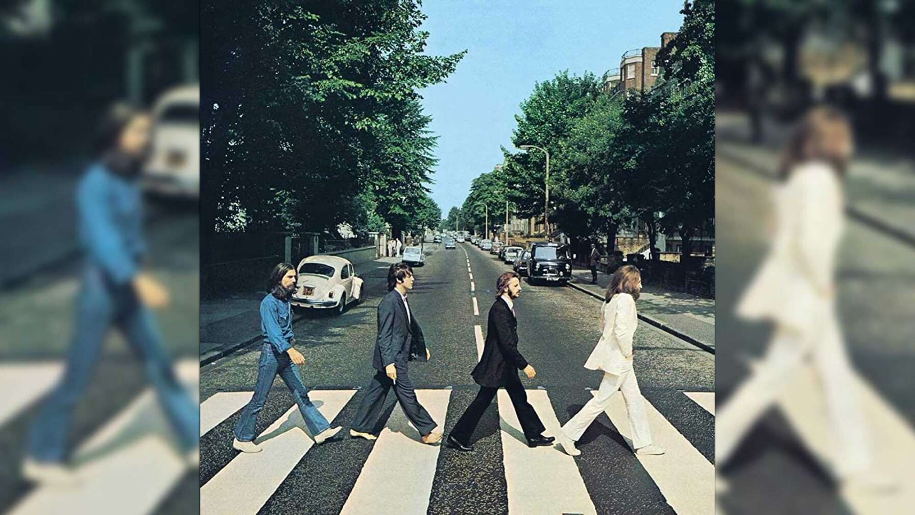 Die Beatles auf dem Zebrastreifen der Abbey Road Studios.