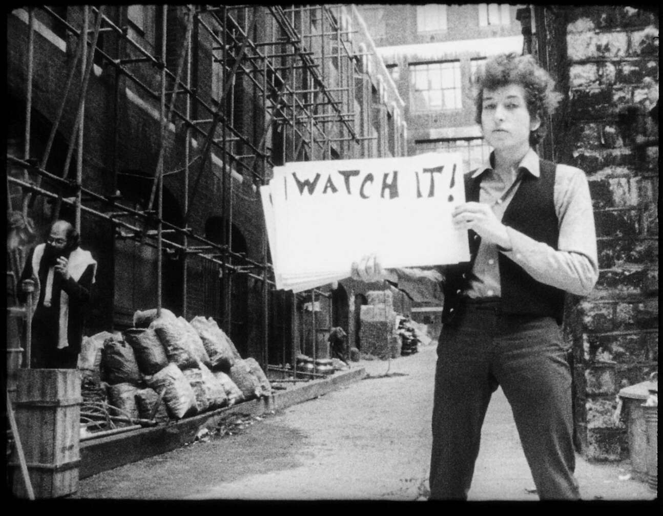 Bob Dylan hält Textkarte zu Subterranean Homesick Blues