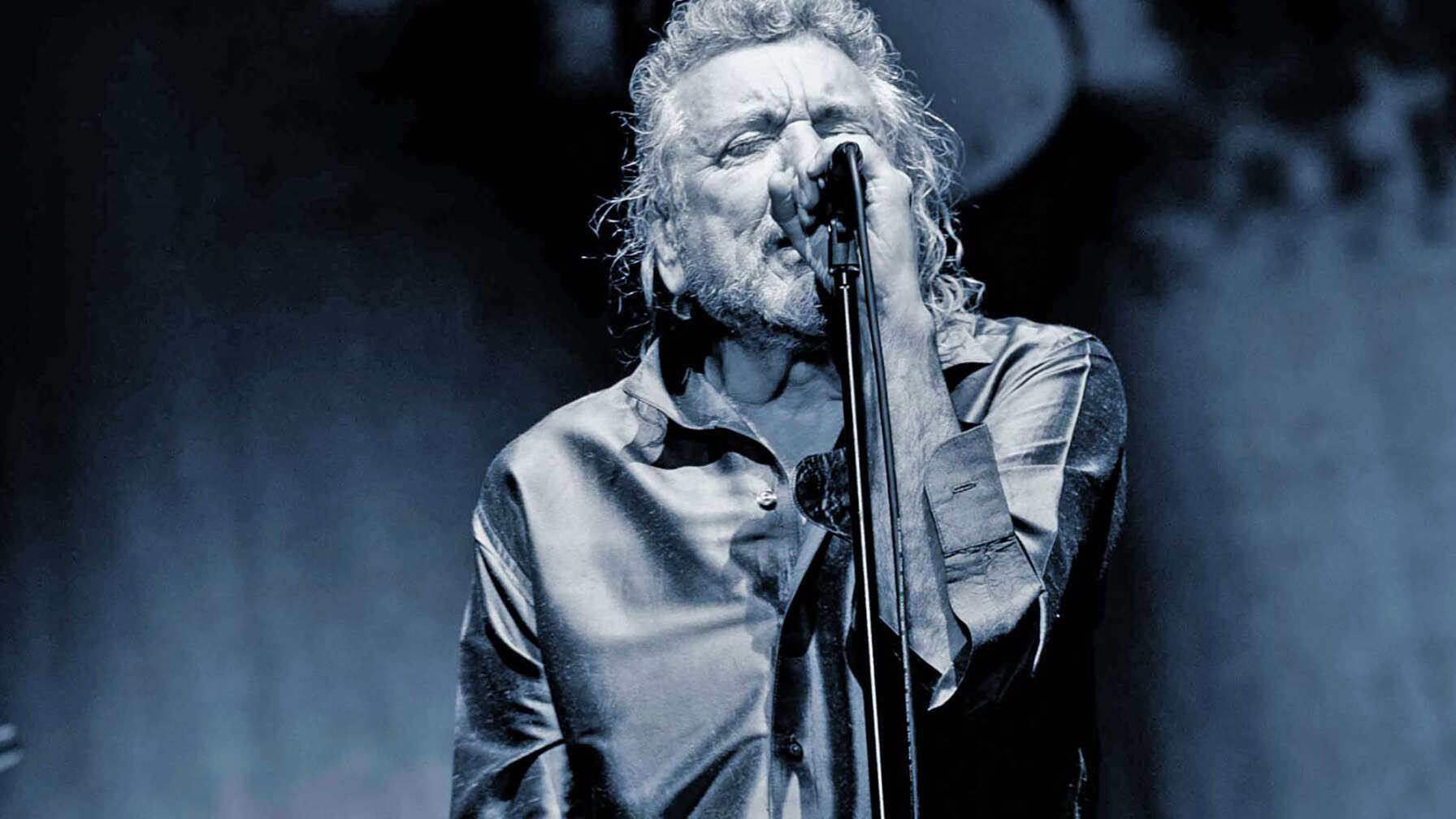 Robert Plant auf der Bühne bei einer Performance als Solokünstler.